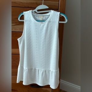 Michael / Michael Kors white pique type sleeveless top with peplum hem.  medium.